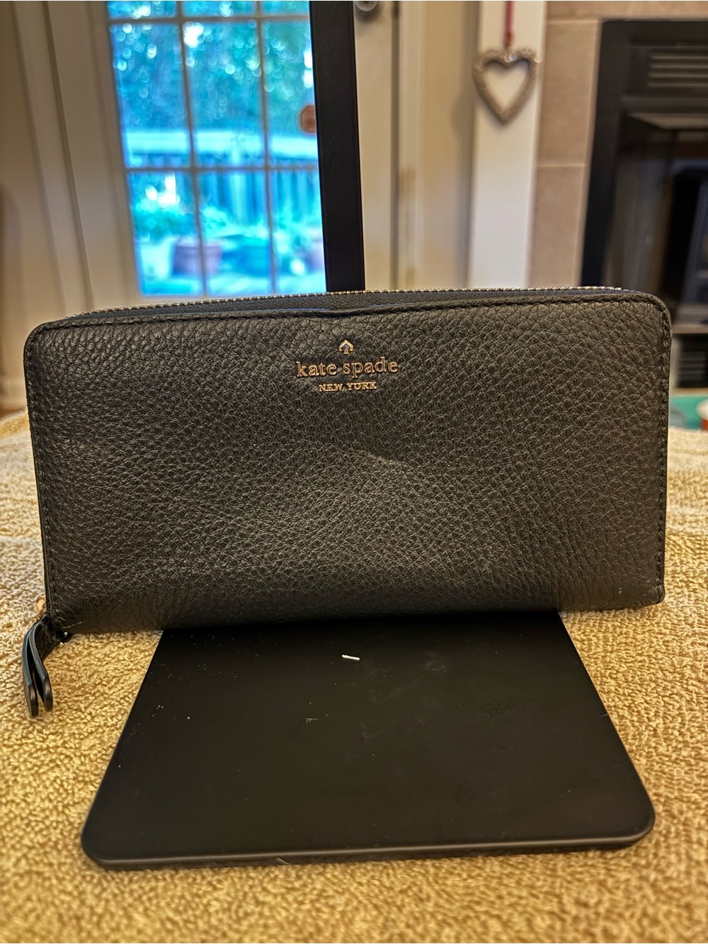 kate spade black pebbled leather zip-around wallet with gold logo
